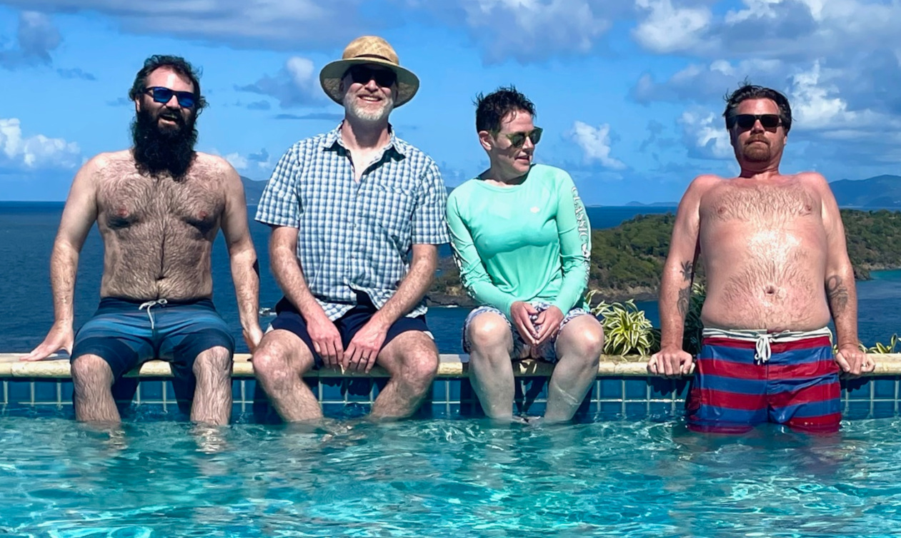 Thunder Kittens in a pool overlooking the Virgin Islands